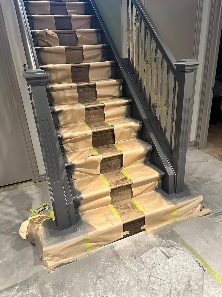 Bungalow Home Renovation — refinished staircase protected during construction