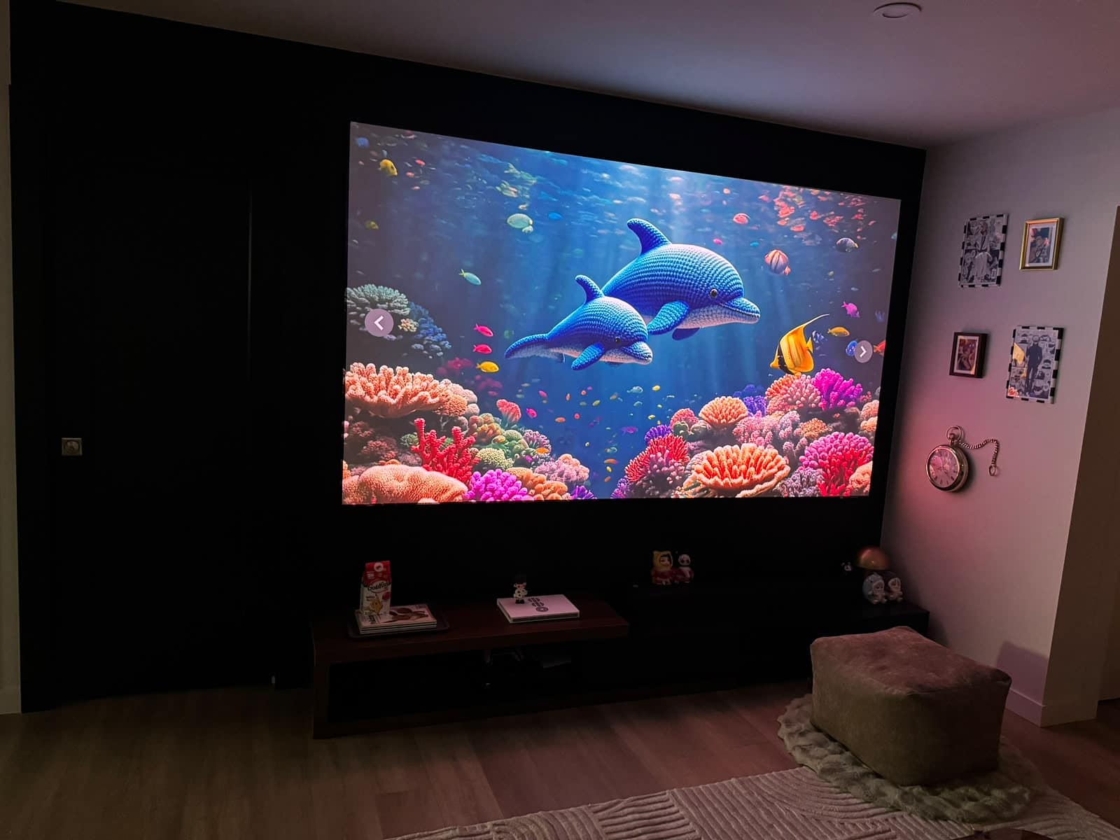 Finished South Edmonton living room with a projector wall built by Cadavid